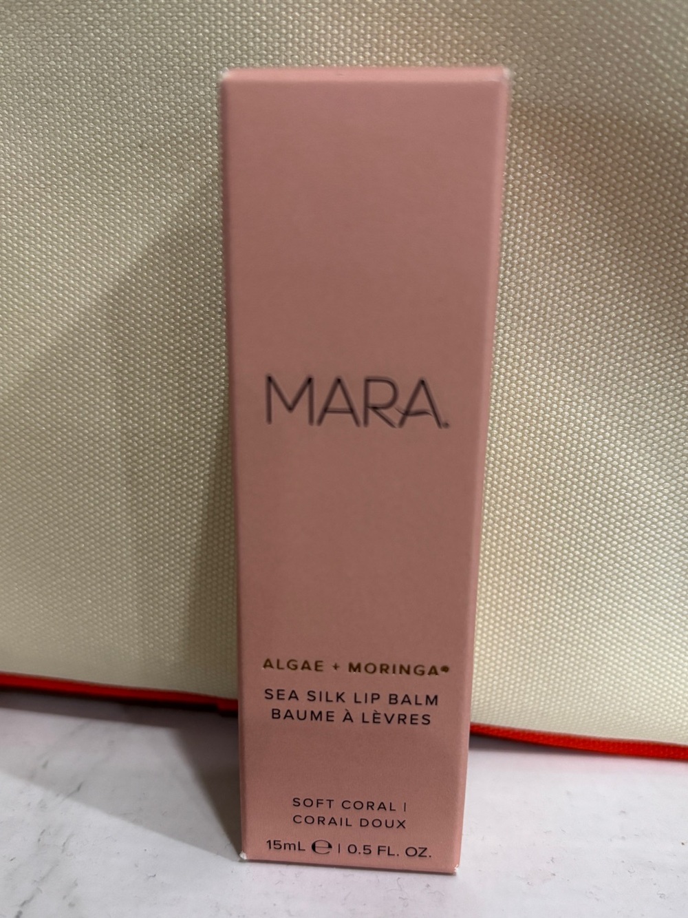 NWT MARA WOMENS ALGAE+MORINGA SEA SILK LIP BALM, SIZE 0.5 FL OZ. soft coral